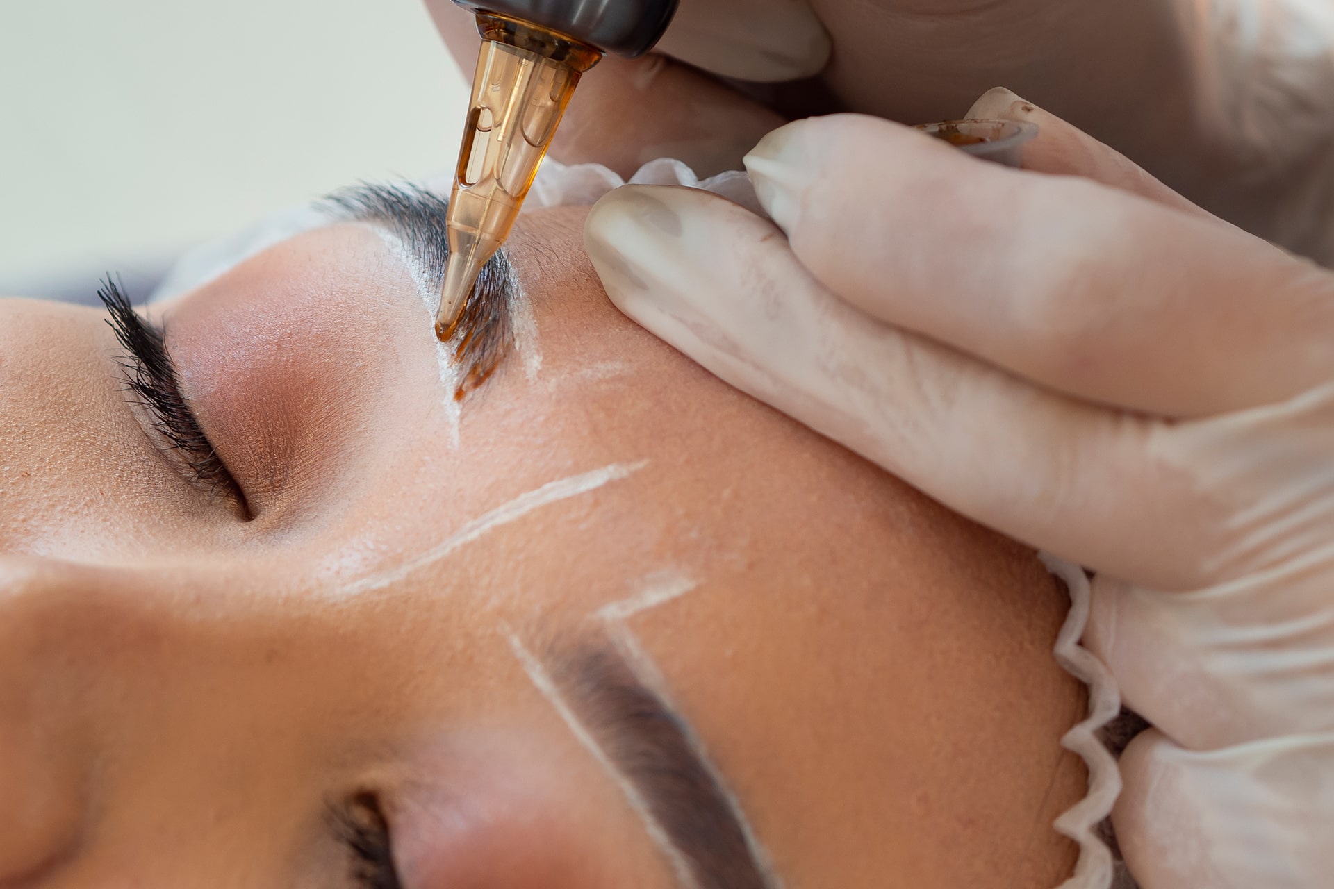 young-woman-going-through-microblading-procedure-2 young-woman-going-through-microblading-procedure-2